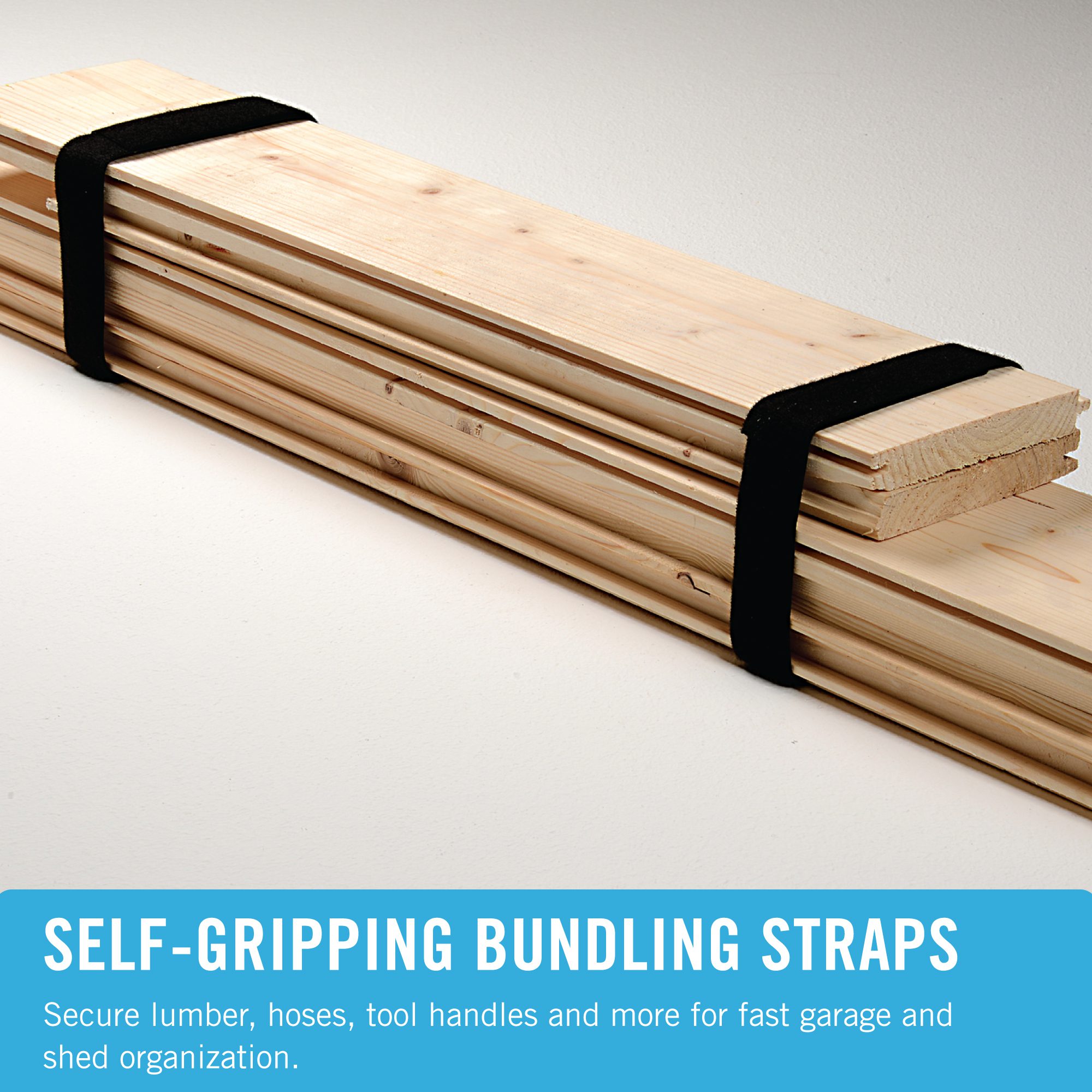 Planks of wood bundled together with ONE-WRAP® Heavy Duty Roll.