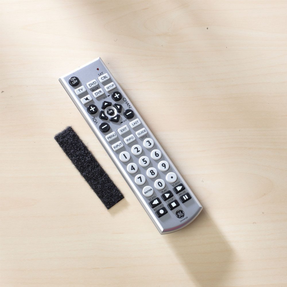 VELCRO® Brand hook and loop strip next to remote control.