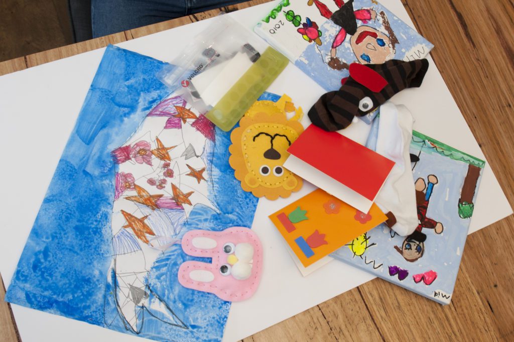 kids artwork messy on table